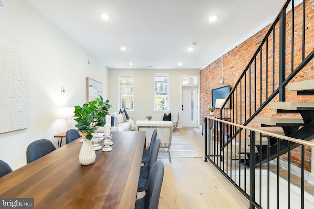 2131 Wharton St, Philadelphia, PA 19146 - dining space with recessed lighting, brick wall, and wood finished floors