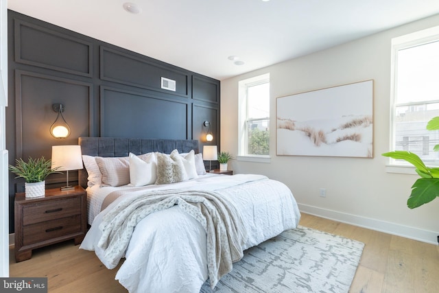 2131 Wharton St, Philadelphia, PA 19146 - bedroom featuring baseboards, visible vents, and light wood-type flooring
