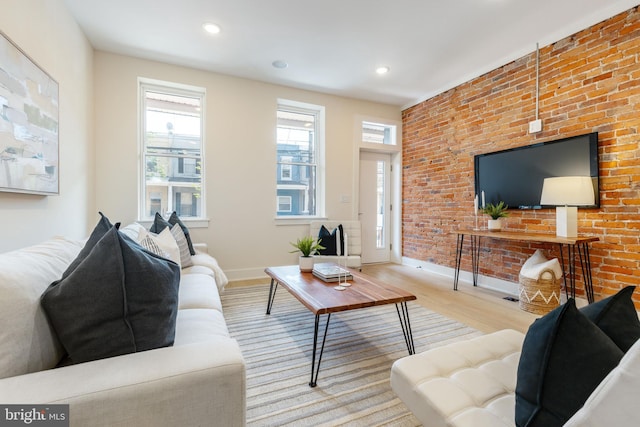 2131 Wharton St, Philadelphia, PA 19146 - living area featuring brick wall, baseboards, recessed lighting, and wood finished floors