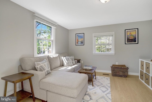 6825 Kincaid Ave, Falls Church, VA 22042 - living room with baseboards, visible vents, and light wood-type flooring