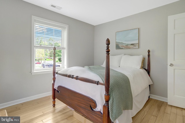 6825 Kincaid Ave, Falls Church, VA 22042 - bedroom featuring baseboards, light wood finished floors, and visible vents