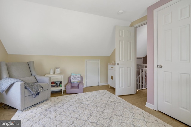 6825 Kincaid Ave, Falls Church, VA 22042 - living area with baseboards, wood finished floors, and vaulted ceiling