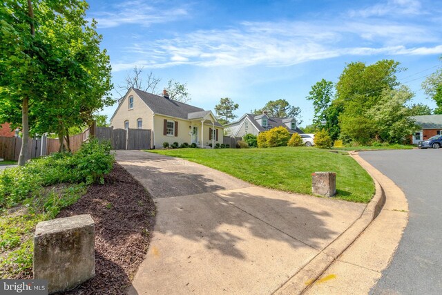 6825 Kincaid Ave, Falls Church, VA 22042 - bungalow-style house featuring concrete driveway, fence, and a front yard