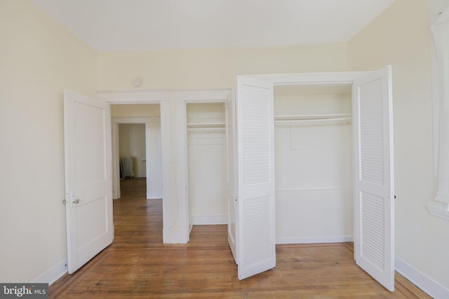 closet with radiator heating unit