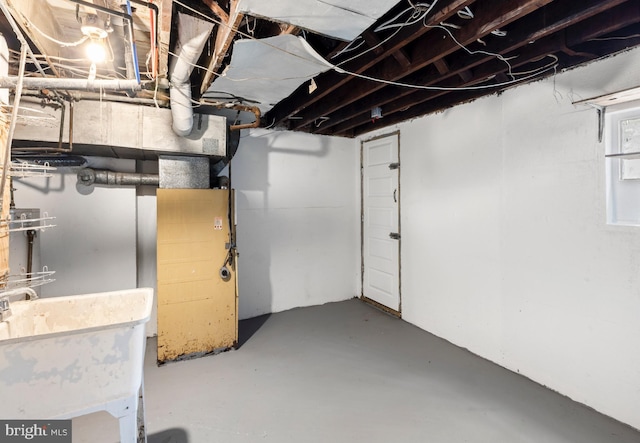 unfinished basement with a sink