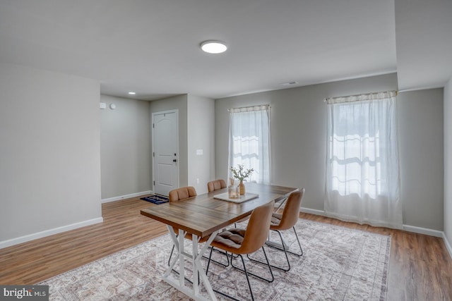 238 Rojan Rd Unit 15, Dover, DE 19901 - dining area featuring baseboards and wood finished floors
