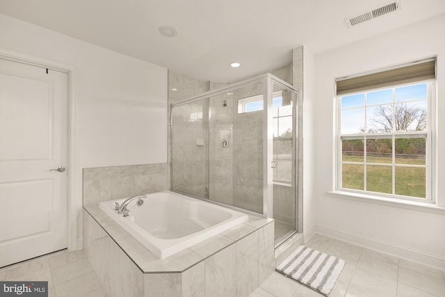 11108 King Gallahan Ct, Clinton, MD 20735 - bathroom with visible vents, a shower stall, and plenty of natural light