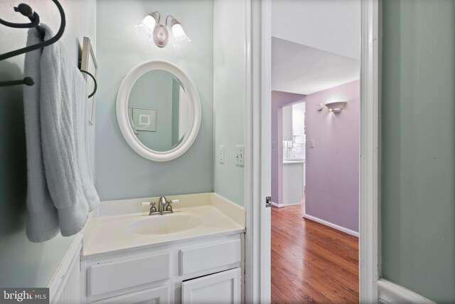 1602 Blacksmith Ln, Herndon, VA 20170 - bathroom featuring vanity and wood finished floors