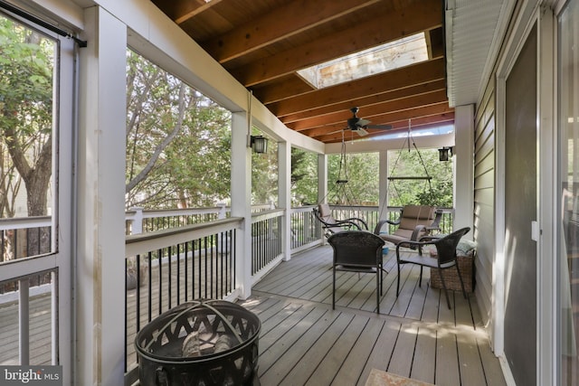 1602 Blacksmith Ln, Herndon, VA 20170 - sunroom with a skylight, a fire pit, and ceiling fan