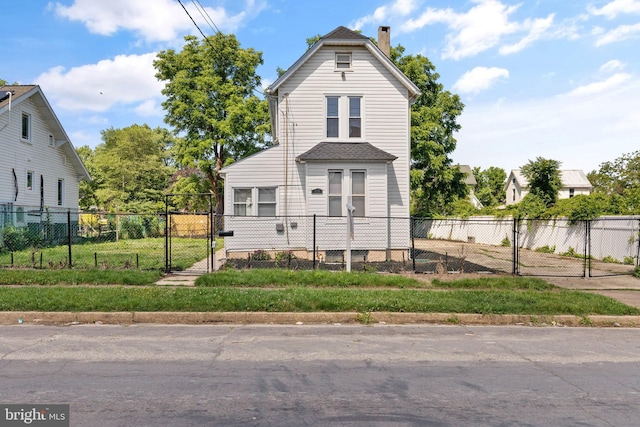 916 N Kresson St, Baltimore, MD 21205 - view of front of property featuring fence private yard, a gate, and a chimney