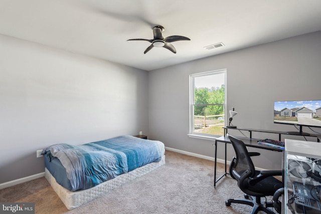 17026 Rollins Rd, Bowling Green, VA 22427 - bedroom featuring carpet, baseboards, a ceiling fan, and visible vents