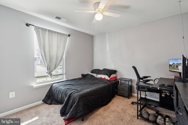 17026 Rollins Rd, Bowling Green, VA 22427 - carpeted bedroom featuring ceiling fan, baseboards, and visible vents