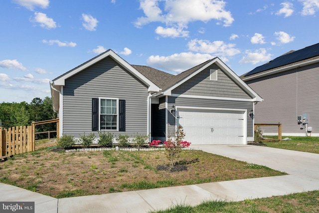 17026 Rollins Rd, Bowling Green, VA 22427 - view of front of property with concrete driveway, a garage, and fence