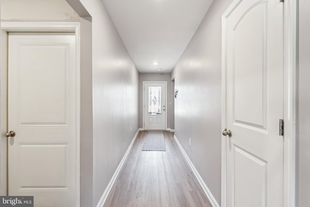 17026 Rollins Rd, Bowling Green, VA 22427 - doorway to outside featuring wood finished floors, baseboards, and recessed lighting