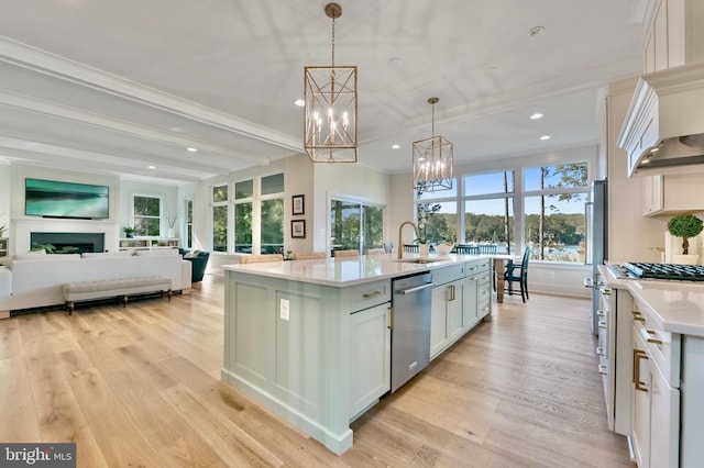 1634 Orchard Beach Rd, Annapolis, MD 21409 - kitchen featuring an inviting chandelier, light countertops, dishwasher, a sink, and open floor plan