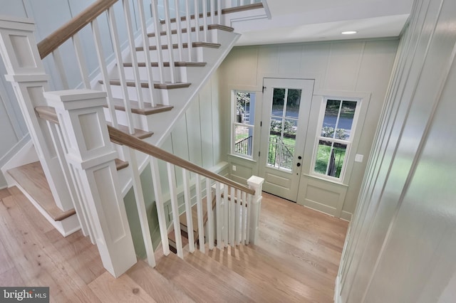 1634 Orchard Beach Rd, Annapolis, MD 21409 - stairway featuring wood finished floors and a decorative wall