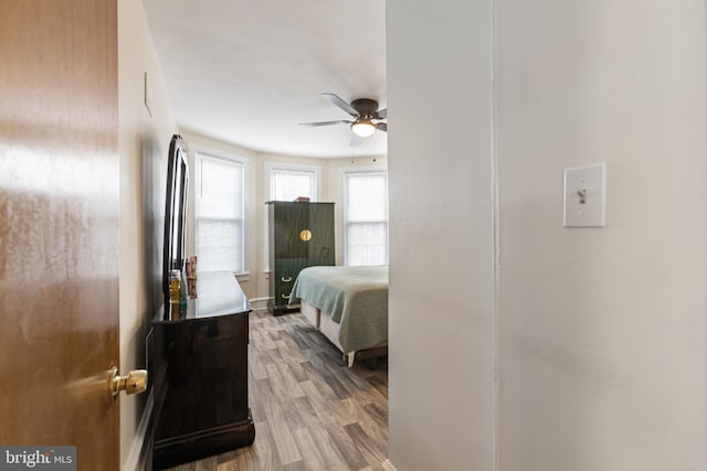 bedroom with wood finished floors
