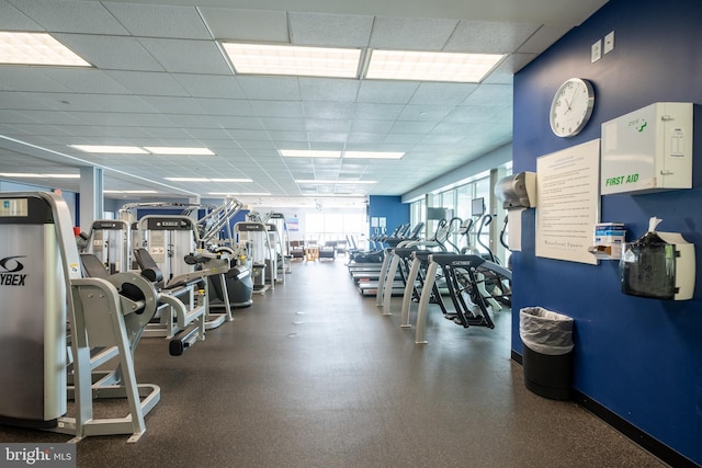 workout area with a drop ceiling