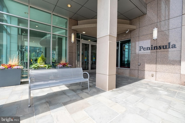 doorway to property featuring a patio