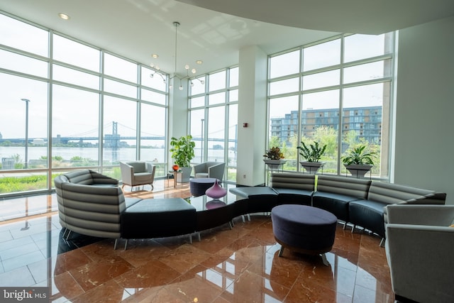 building lobby featuring a water view