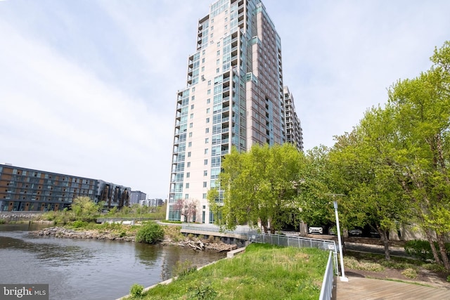 view of home's community featuring a water view