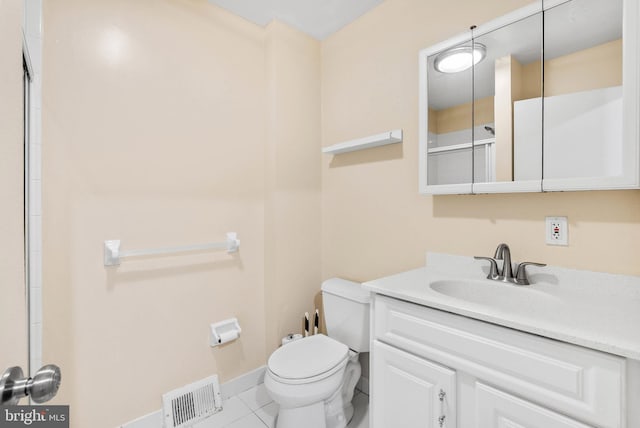 914 Spruce St Unit 9, Philadelphia, PA 19107 - bathroom with visible vents, baseboards, toilet, vanity, and tile patterned flooring