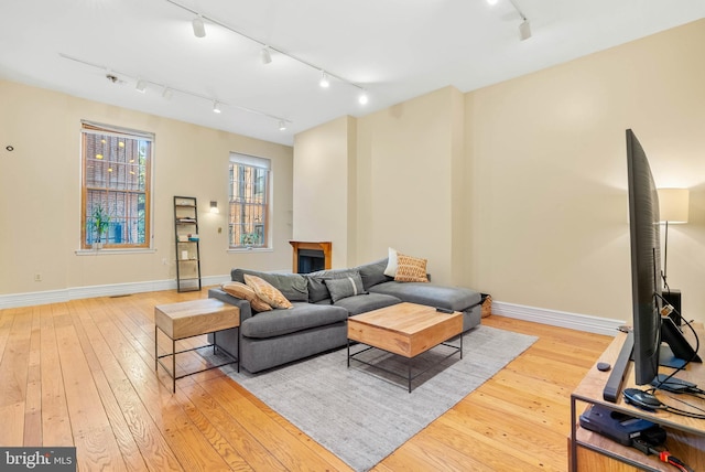 914 Spruce St Unit 9, Philadelphia, PA 19107 - living area featuring track lighting and light wood-style floors