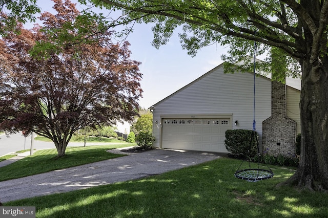 5433 Lomax Way, Woodbridge, VA 22193 - view of property exterior featuring driveway, a yard, and an attached garage
