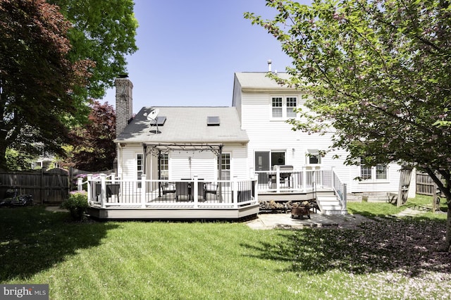 5433 Lomax Way, Woodbridge, VA 22193 - back of house with a chimney and a wooden deck