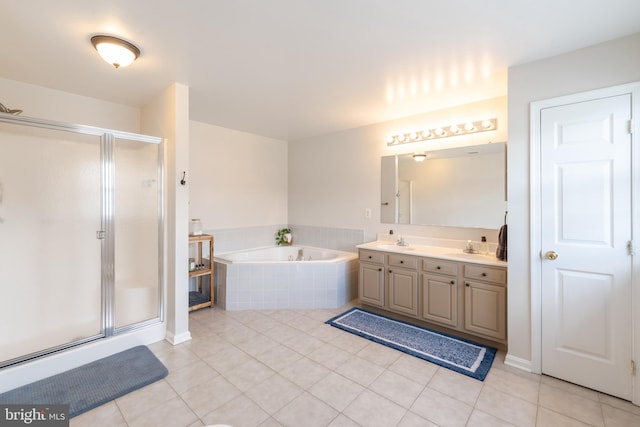 7815 Outing Ave, Pasadena, MD 21122 - full bath featuring double vanity, a bath, tile patterned flooring, and a shower stall