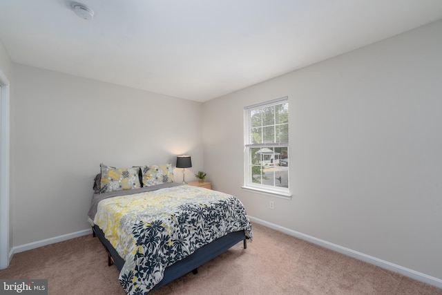 7815 Outing Ave, Pasadena, MD 21122 - carpeted bedroom with baseboards