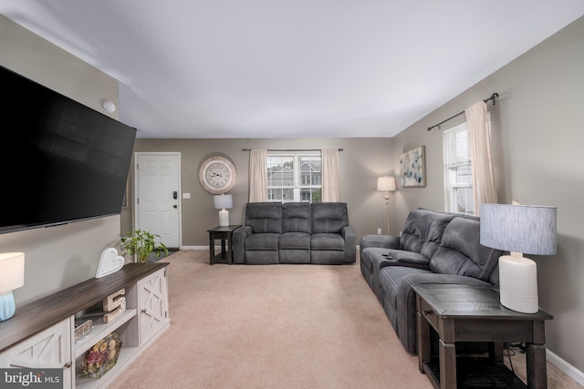 7815 Outing Ave, Pasadena, MD 21122 - carpeted living area featuring baseboards