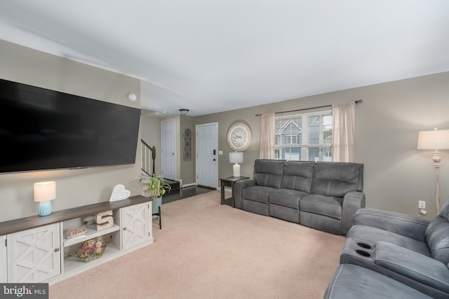 7815 Outing Ave, Pasadena, MD 21122 - living room featuring carpet floors and stairs