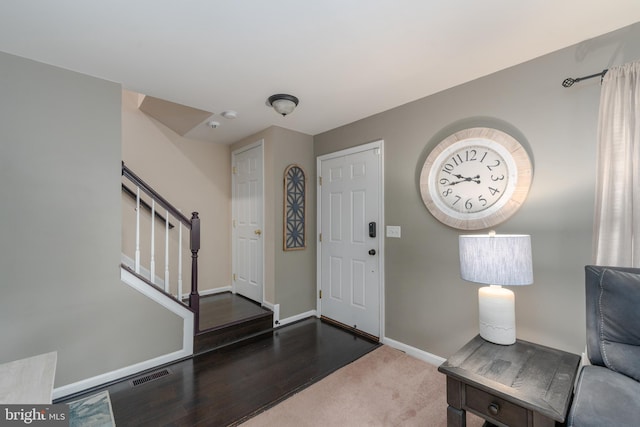 7815 Outing Ave, Pasadena, MD 21122 - carpeted foyer featuring stairs and baseboards