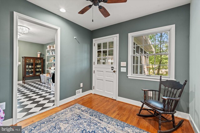 4812 Maury Ln, Alexandria, VA 22304 - foyer featuring visible vents, a ceiling fan, baseboards, and wood finished floors