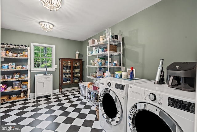 4812 Maury Ln, Alexandria, VA 22304 - washroom with dark floors, washing machine and dryer, and cabinet space