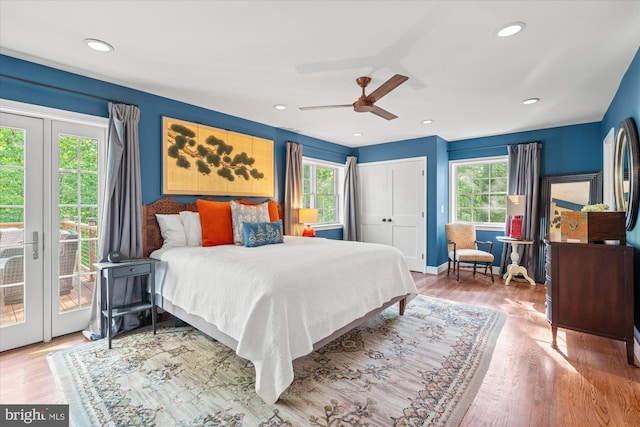4812 Maury Ln, Alexandria, VA 22304 - bedroom featuring a ceiling fan, multiple windows, wood finished floors, and access to exterior