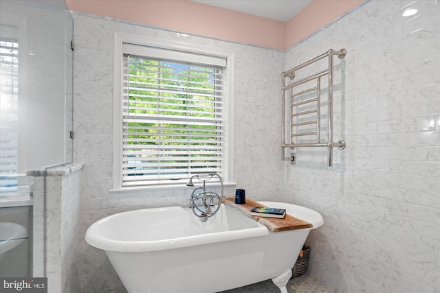 4812 Maury Ln, Alexandria, VA 22304 - full bathroom featuring tile walls and a soaking tub