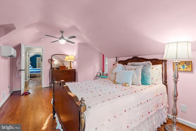 4812 Maury Ln, Alexandria, VA 22304 - bedroom featuring baseboards, a wall unit AC, wood finished floors, and lofted ceiling