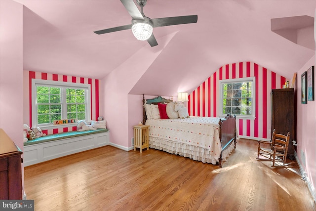 4812 Maury Ln, Alexandria, VA 22304 - bedroom with a ceiling fan, multiple windows, wood finished floors, and lofted ceiling