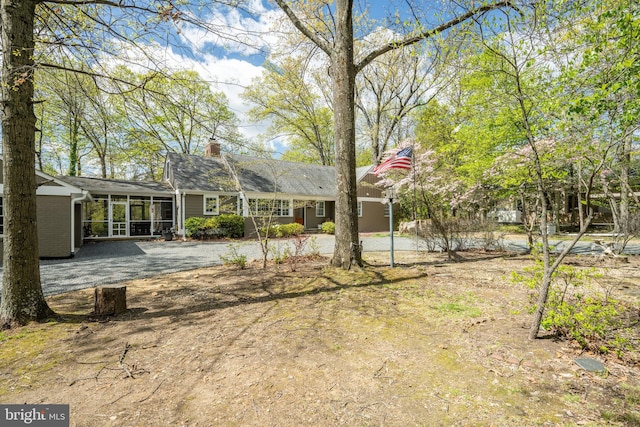 4812 Maury Ln, Alexandria, VA 22304 - back of house with a chimney and a sunroom