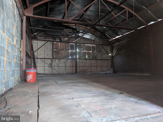 garage with concrete block wall