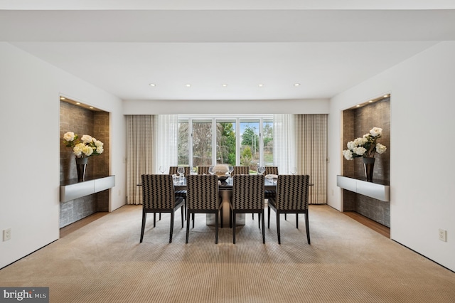 carpeted dining area featuring recessed lighting