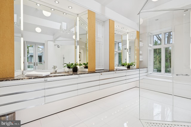 bathroom featuring vanity and plenty of natural light