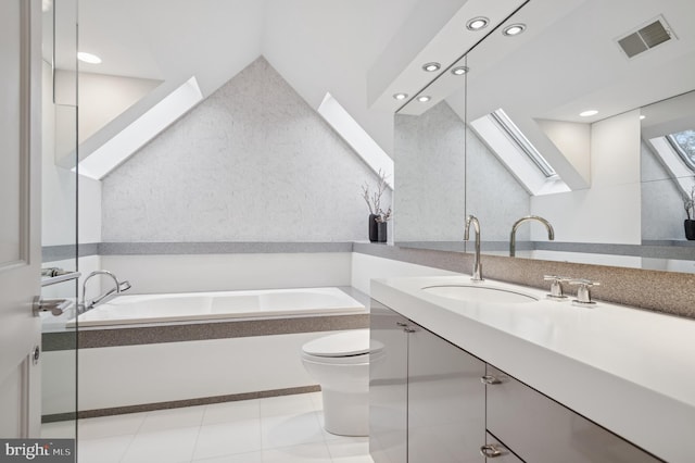 bathroom with vanity, toilet, recessed lighting, visible vents, and a garden tub