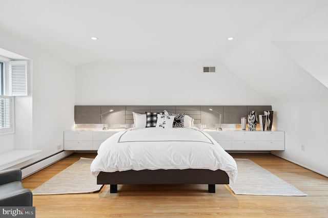 bedroom with baseboard heating, light wood-style floors, recessed lighting, vaulted ceiling, and visible vents