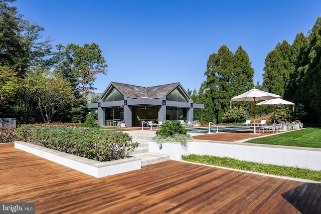 exterior space featuring a patio and an outdoor pool