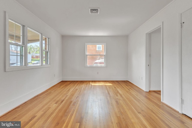 9410 Spotsylvania St, Manassas, VA 20110 - unfurnished bedroom with baseboards, light wood-style flooring, and visible vents