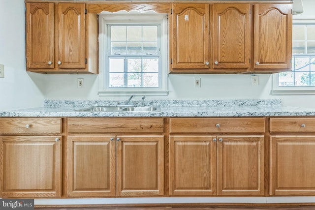 9410 Spotsylvania St, Manassas, VA 20110 - kitchen with light stone counters and a sink