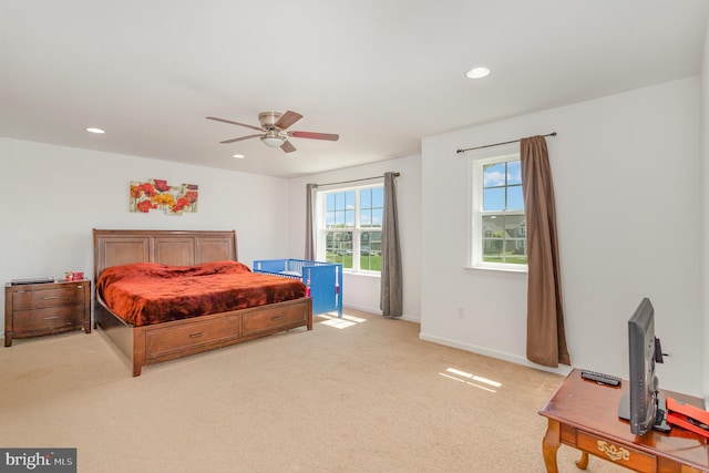 bedroom with baseboards, ceiling fan, recessed lighting, and light colored carpet